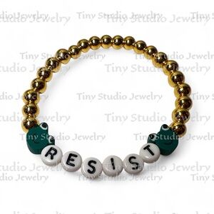 Frogtifa beaded bracelet with frog  spacer charm bead